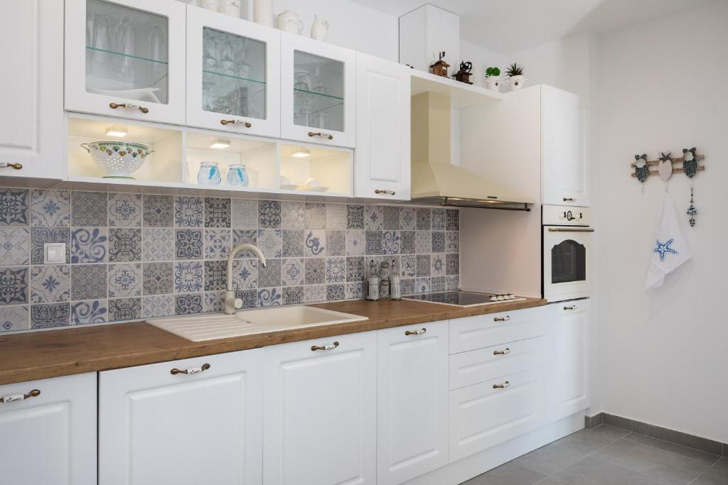 Doppelhaushälfte mit Aussicht - In Makarska